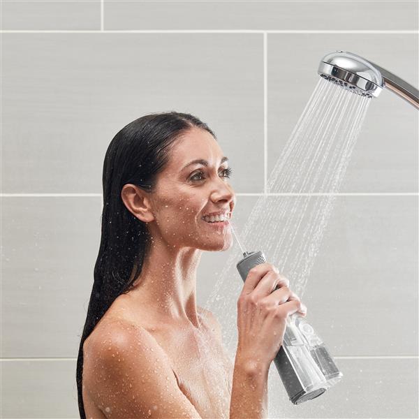 Using Gray Cordless Revive Water Flosser WF-03 in Shower