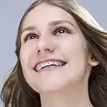 Boy with braces smiling