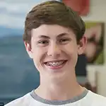 Boy with braces smiling