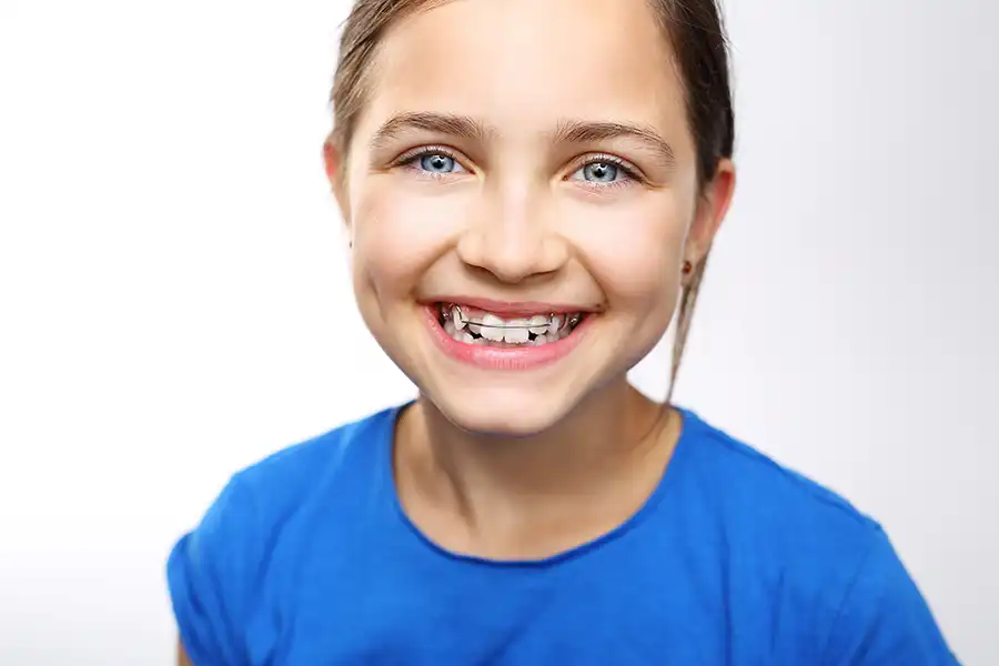 Girl with braces smiling