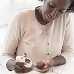 Woman doing insulin check