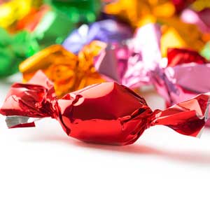 Image of wrapped red, orange, pink, green, and purple candies