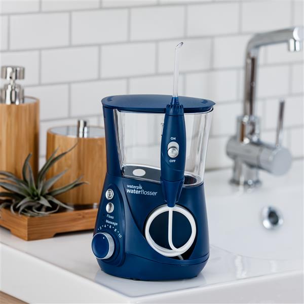 Blue Aquarius Professional Series Water Flosser WP-673 In Bathroom