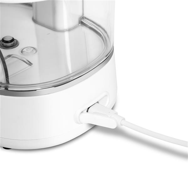 Charging port on the base of the white ION countertop water flosser.