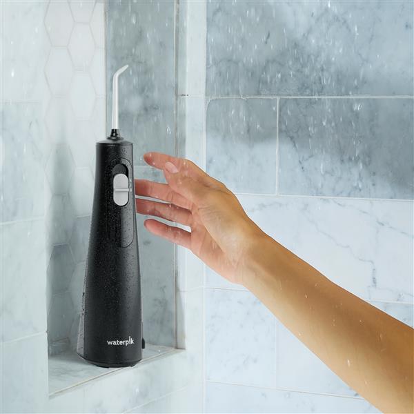 Black Cordless 1100 Water Flosser WF-30CD012 in Shower