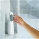 White Cordless Enhance 3200 handheld water flosser with retail packaging.