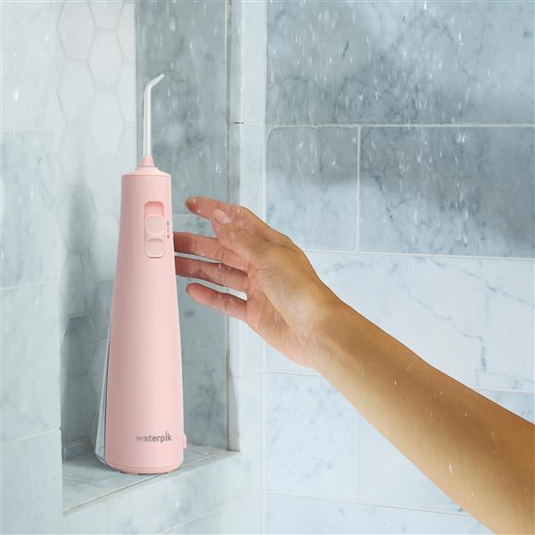 Pink Cordless Pulse 3100 Water Flosser WF-20CD014 in Shower