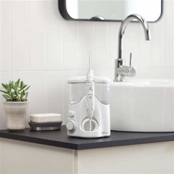 Waterpik Countertop Water Flosser with Boost Tip in Bathroom