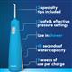 Cyan Cordless Pulse 3100 handheld water flosser features: 2 specialty tips, 2 pressure settings, use in the shower, 45 seconds of water capacity, and 9 weeks of use per charge.