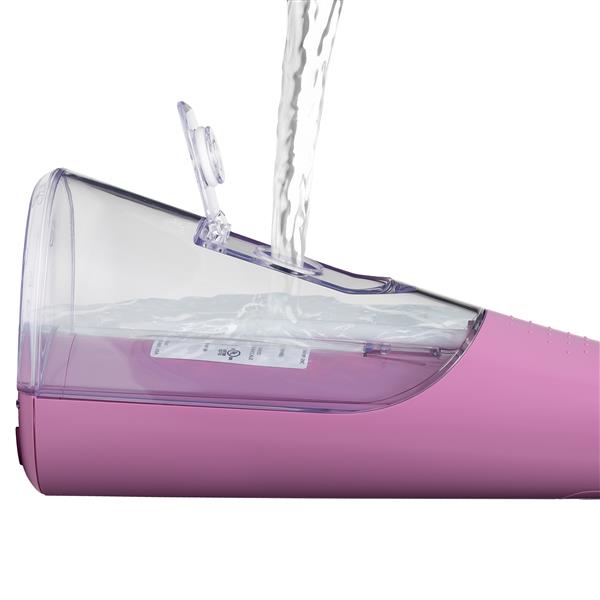 Filling the water reservoir of the mauve Cordless Pulse 3100 handheld water flosser.