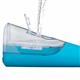 Filling the water reservoir of the cyan Cordless Pulse 3100 handheld water flosser.