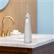 Gray Cordless handheld water flosser on a bathroom sink.