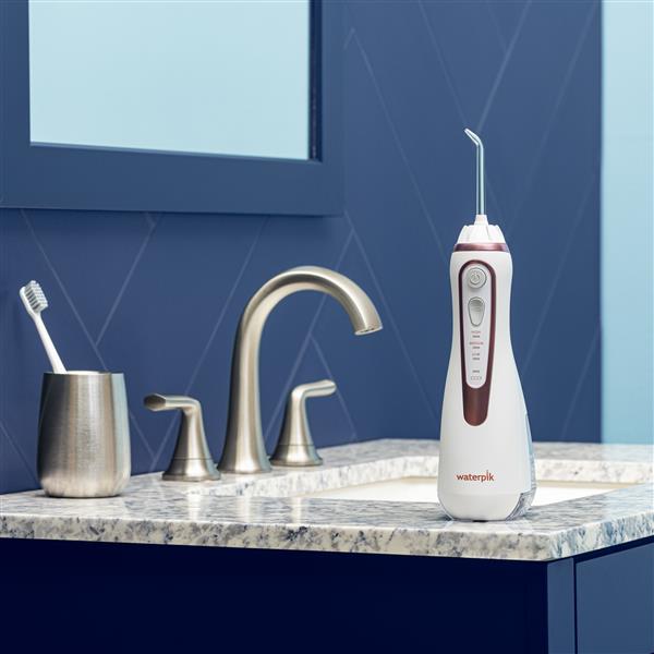Rose Gold Cordless Advanced 2.0 Water Flosser WP-589 In Bathroom