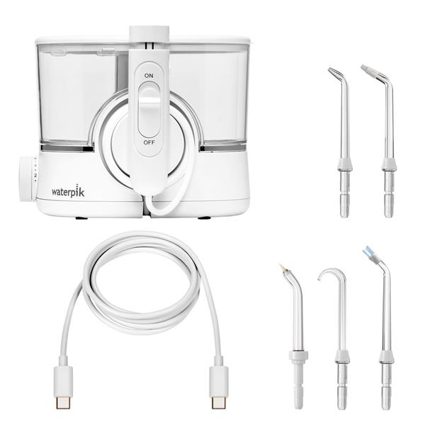 White ION countertop water flosser with 1 Precision tip, 1 Orthodontic tip, 1 Pik Pocket tip, 1 Implant Denture tip, 1 Plaque Seeker tip, and charging cable.