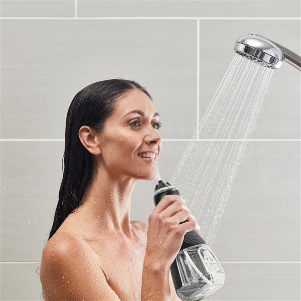 Using Black Cordless Advanced Water Flosser WP-582 in Shower