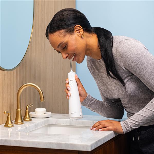 Using WF-21 White Cordless Enhance 3000 Water Flosser