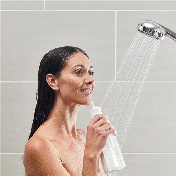 Using White Cordless Express Water Flosser WF-02 in Shower