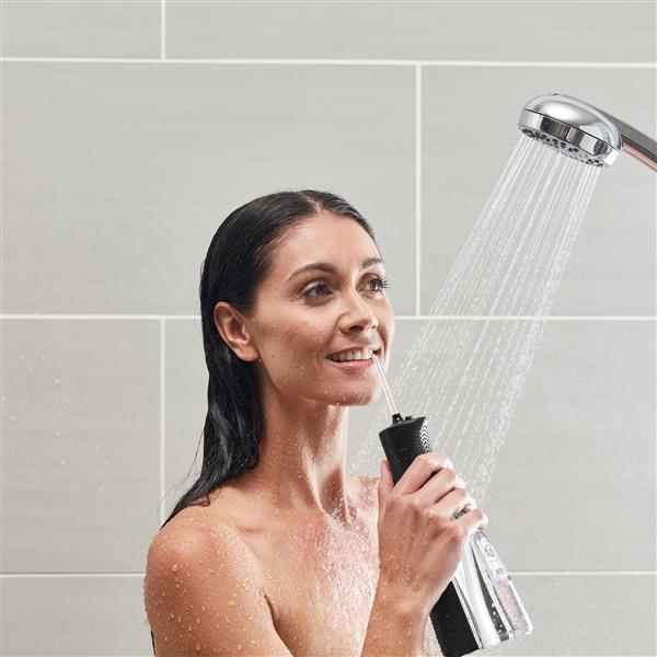 Using Black Cordless Freedom Water Flosser WF-03 in Shower
