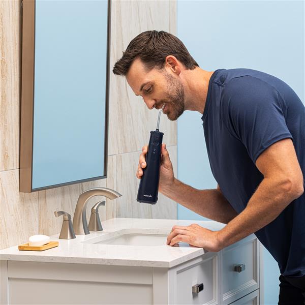 Using WF-27CD013 Blue Cordless Gem 5100 Water Flosser