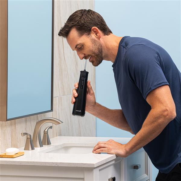 Using WF-26W012 Black Cordless Plus 5000 Water Flosser
