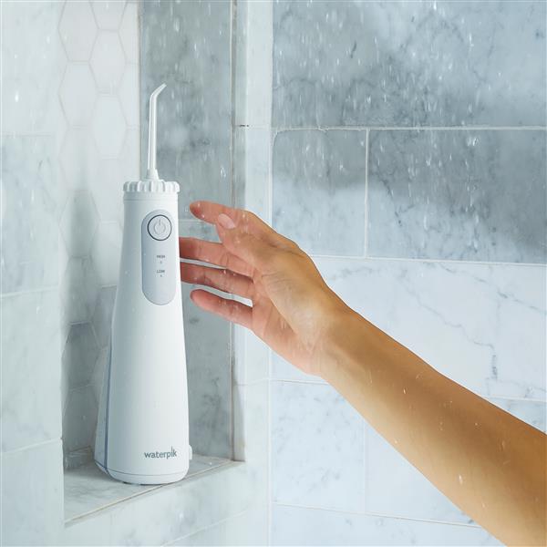 White Cordless Select 5100 Water Flosser WF-28W010 in Shower