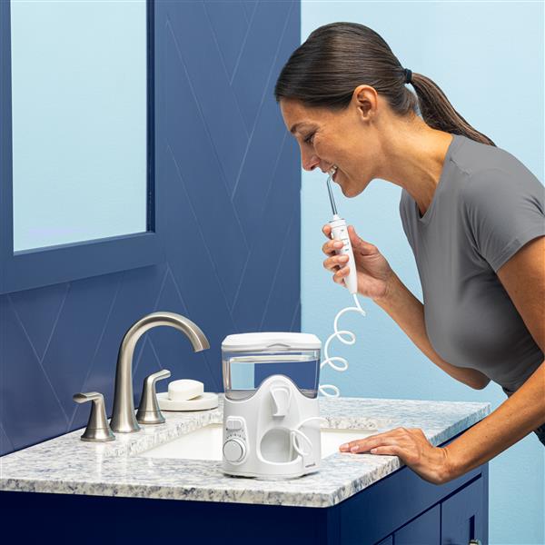 Using White Ultra Plus Water Flosser WF-150