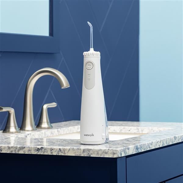White Cordless Gem 5100 Water Flosser WF-27 in Bathroom