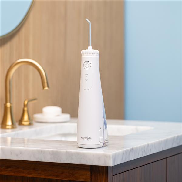 White Cordless Plus 5000 Water Flosser WF-26 in Bathroom
