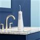White Cordless Select 5100 Water Flosser WF-28 in Bathroom